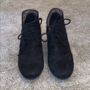 black wedges with cheetah print on the inside